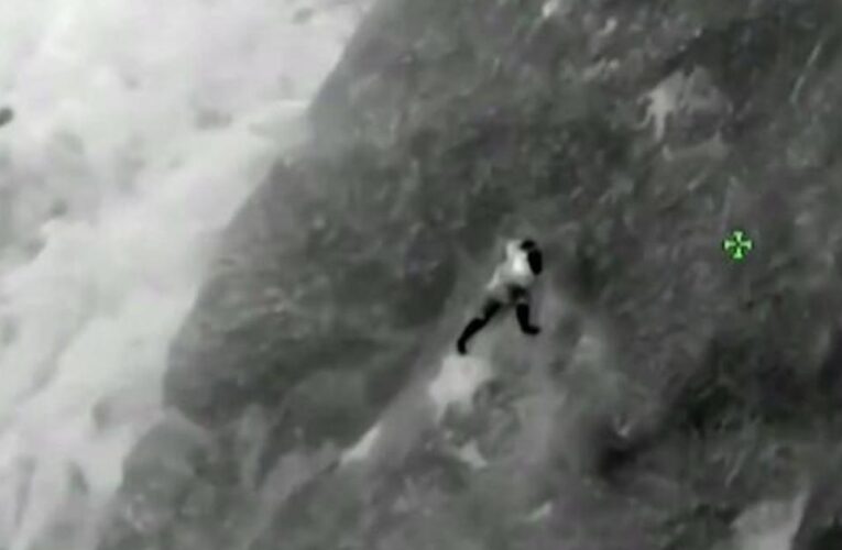 Barefoot man rescued via helicopter as he clings to California cliffside