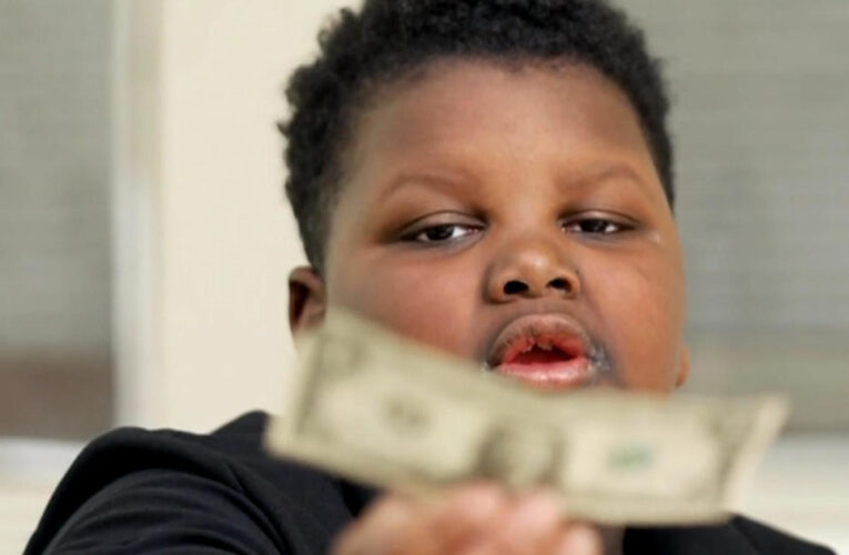 A boy gave away his only dollar. In exchange, he was rewarded for his generosity.