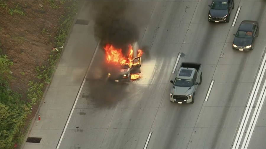 van-engulfed-in-flames-causes-major-delays-on-105-freeway 