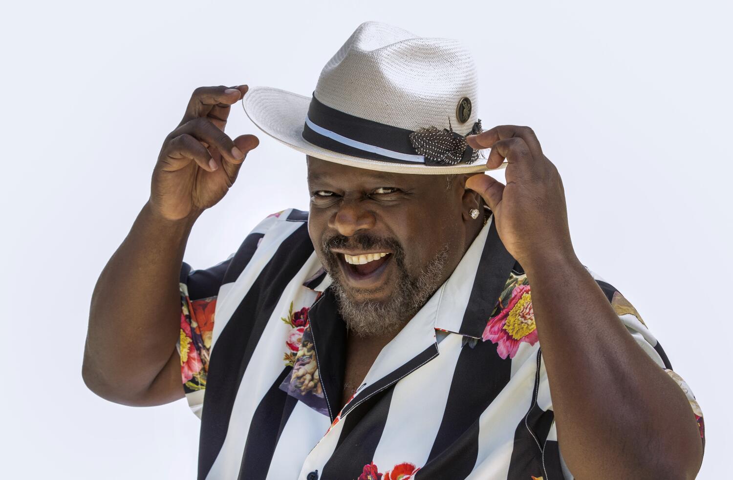 cedric-the-entertainer-uses-his-punchlines-to-branch-out-and-give-back-during-netflix-is-a-joke