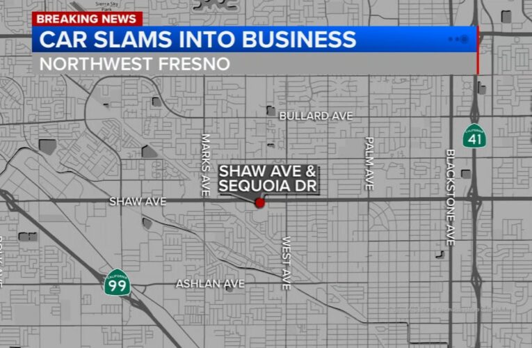 SUV crashes into storage area behind Fresno catering business