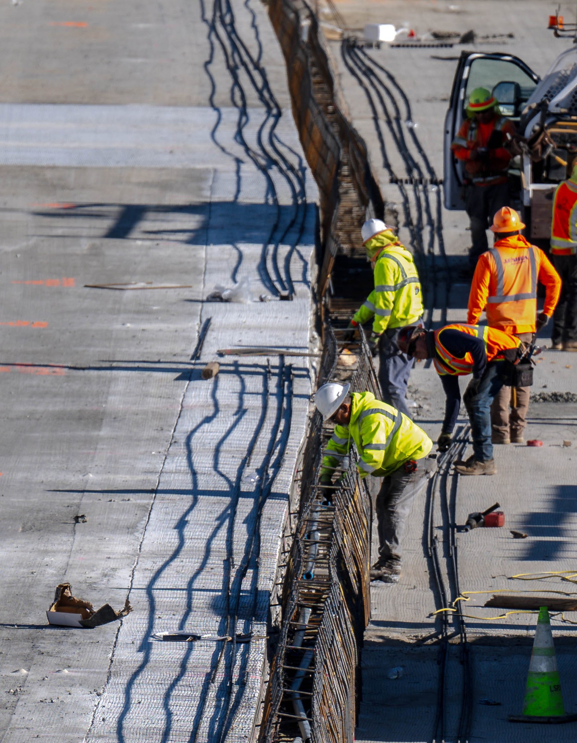 Construction crews work on phase one of the 10 Freeway expansion project near the Vineyard Avenue overpass in Ontario on Tuesday, Jan. 9, 2024. (Photo by Watchara Phomicinda, The Press-Enterprise/SCNG)