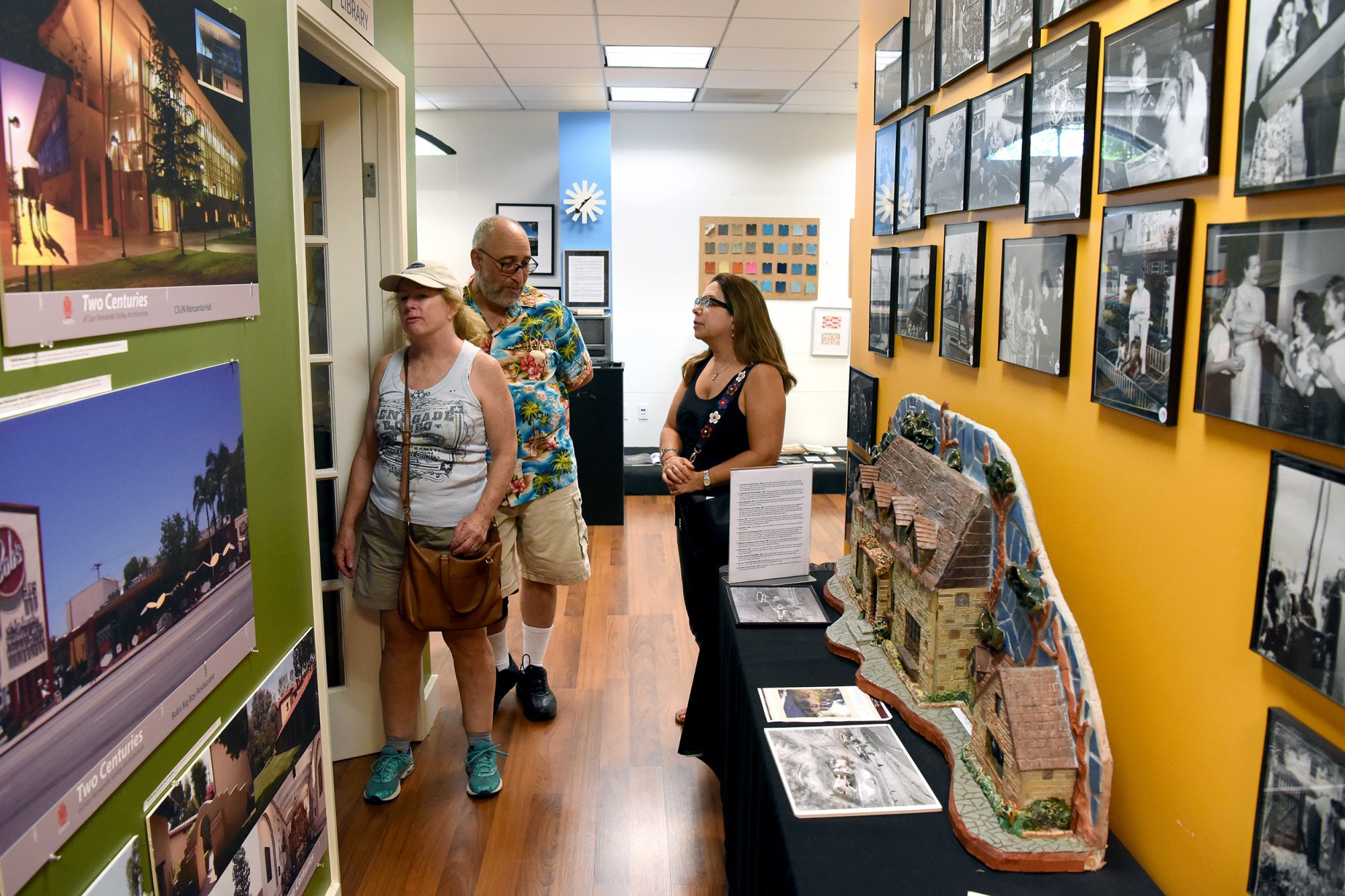 People look at displays in the Museum of the San Fernando Valley. (Photo by Michael Owen Baker)
