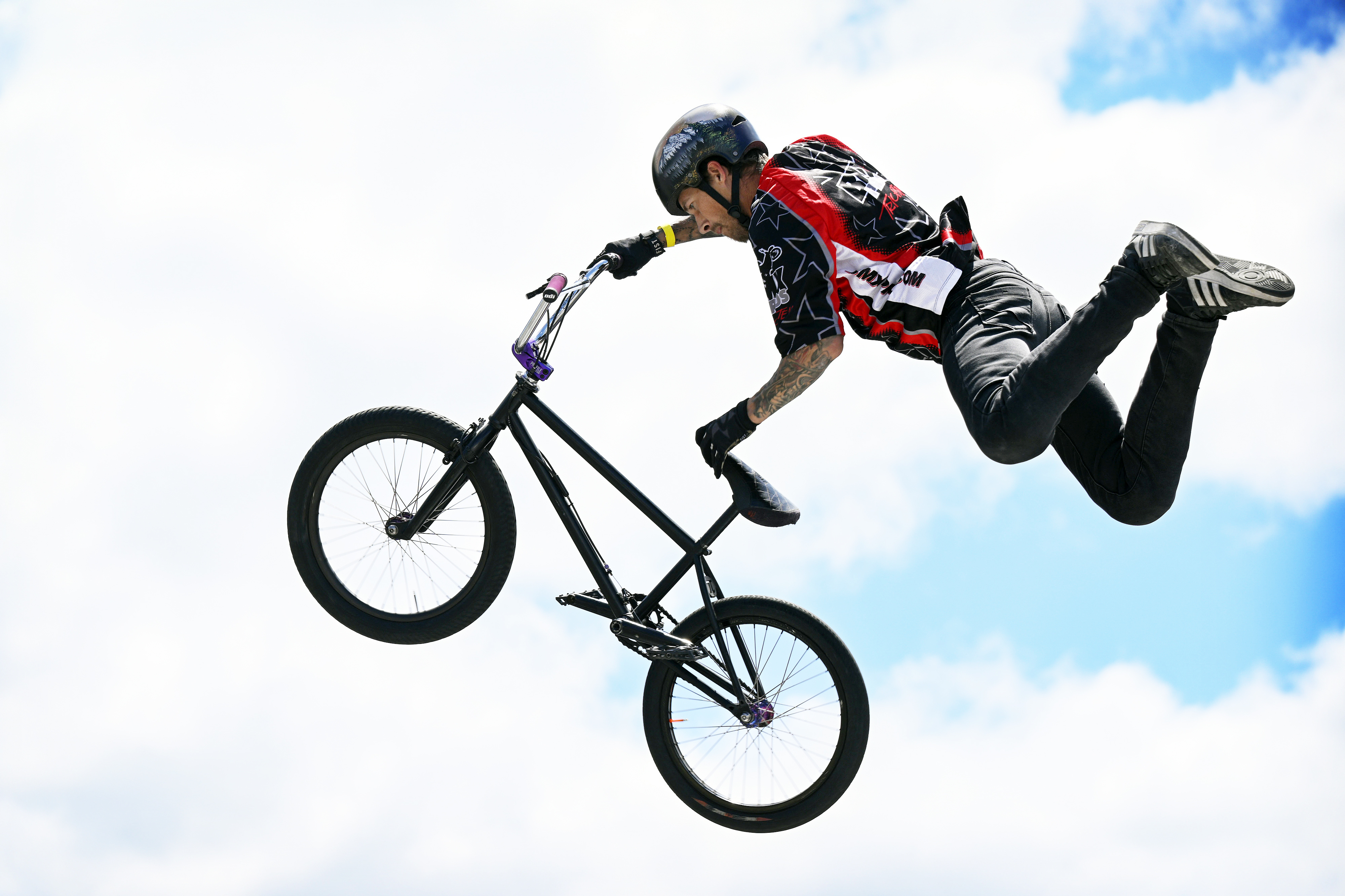 A local pro-BMX rider is preforms a jump at 38th...