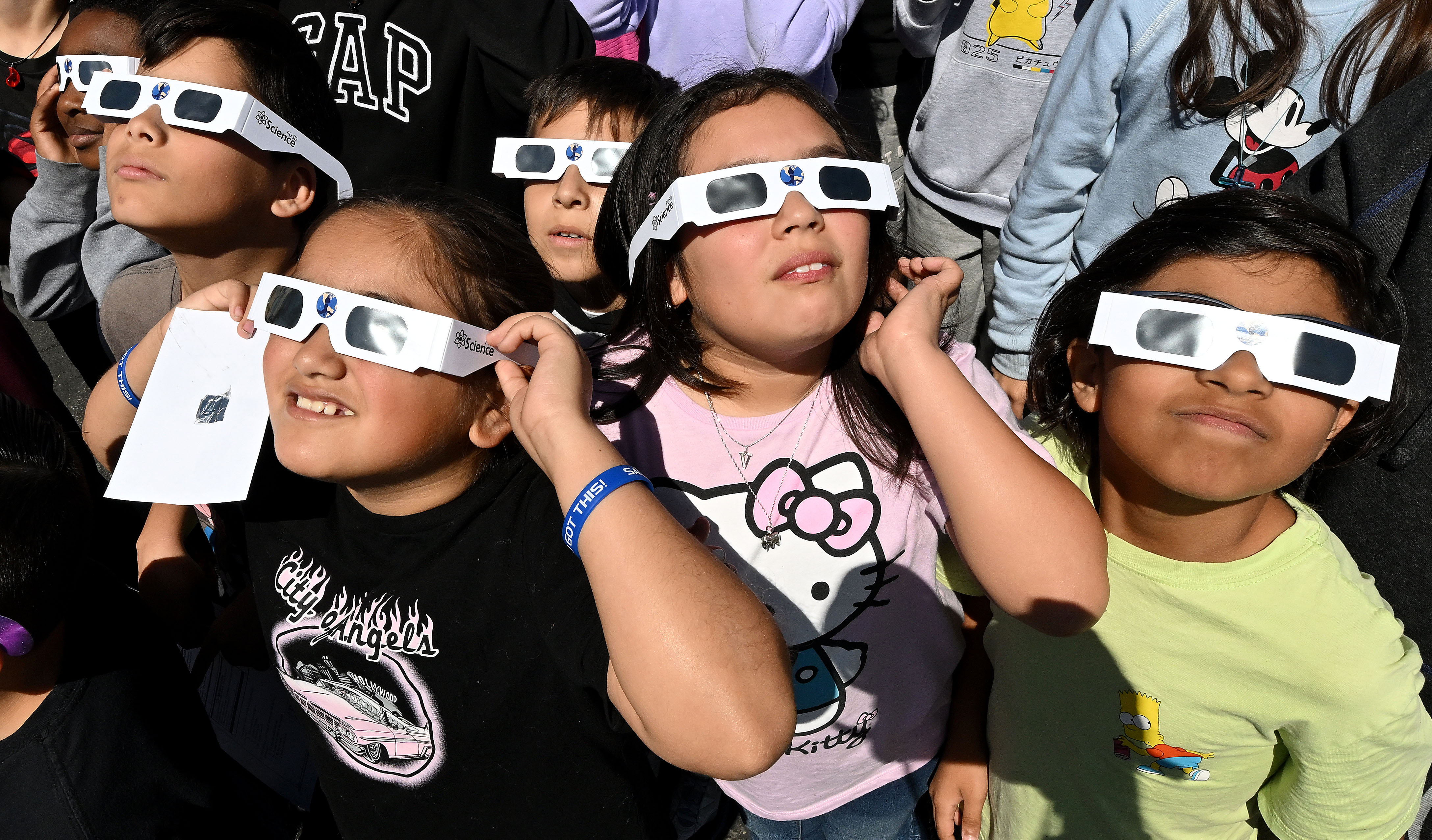 Shadow Hills Elementary School students watch the solar eclipse in...