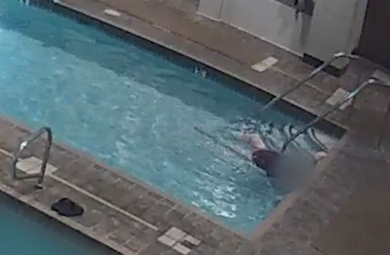 Heartbreaking video shows swimmers ignore drowning woman