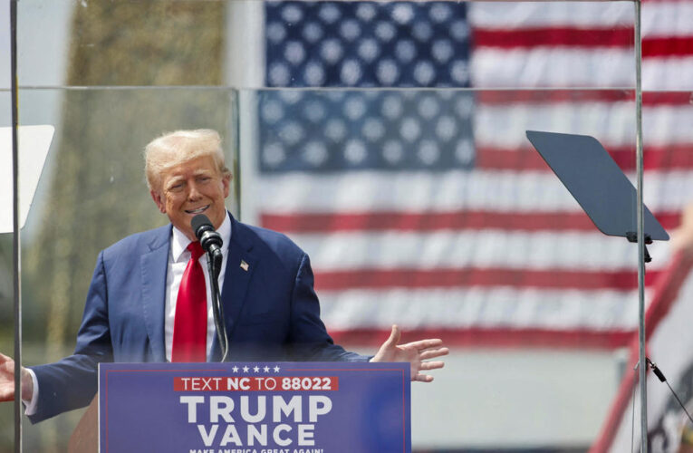 Trump returns to outdoor rallies, now surrounded by bulletproof glass