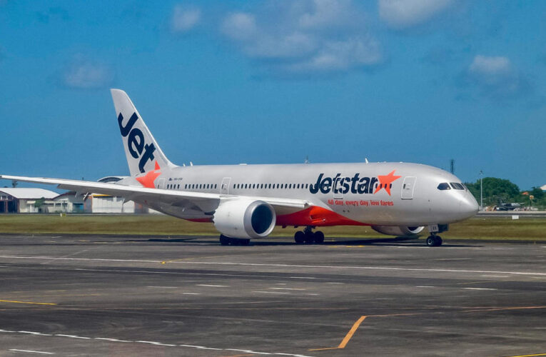 Passenger opens jet’s door and walks on wing after landing