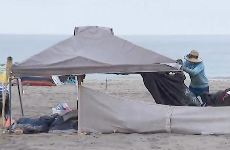 Homeless encampment at Dockweiler State Beach near LAX cleared by city workers