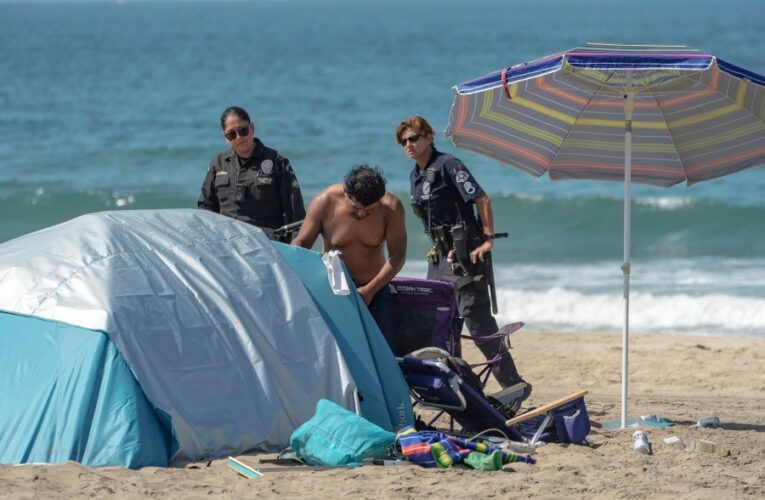 Photos: Officials clear homeless encampments from Dockweiler Beach