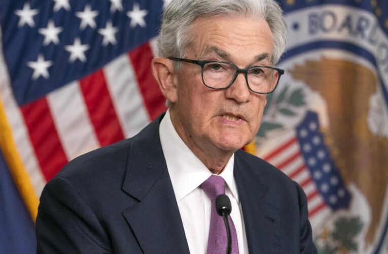 Fed leader, concerned about jobs downturn, tees up interest rate cuts