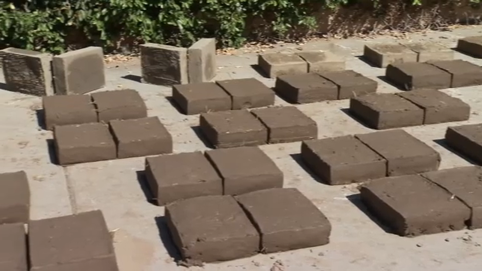 fresno-state-students-and-staff-learning-how-to-make-adobe-bricks-from-expert