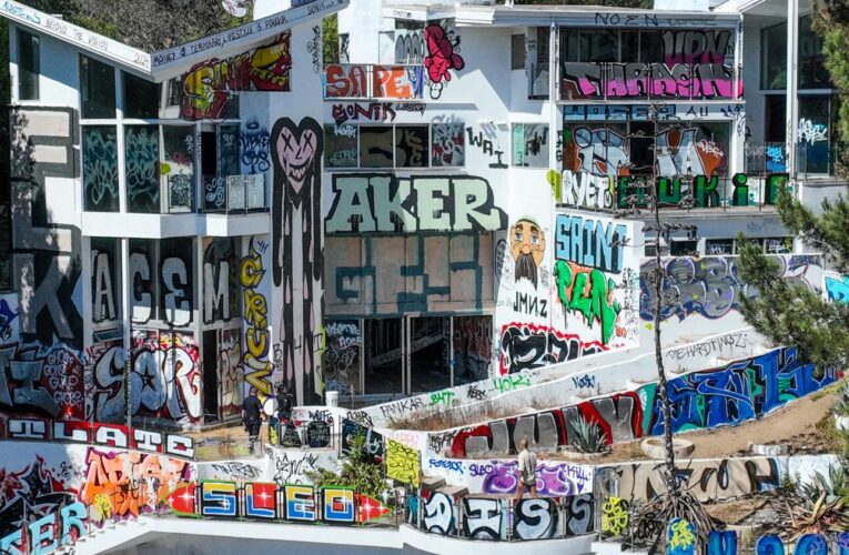 A billionaire’s son and his graffiti-scarred mansions roiling Hollywood Hills