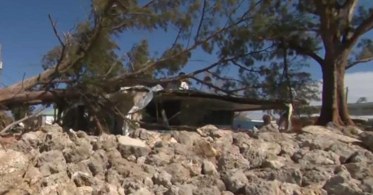 florida-residents-face-mountains-of-debris-and-mud,-footage-shows