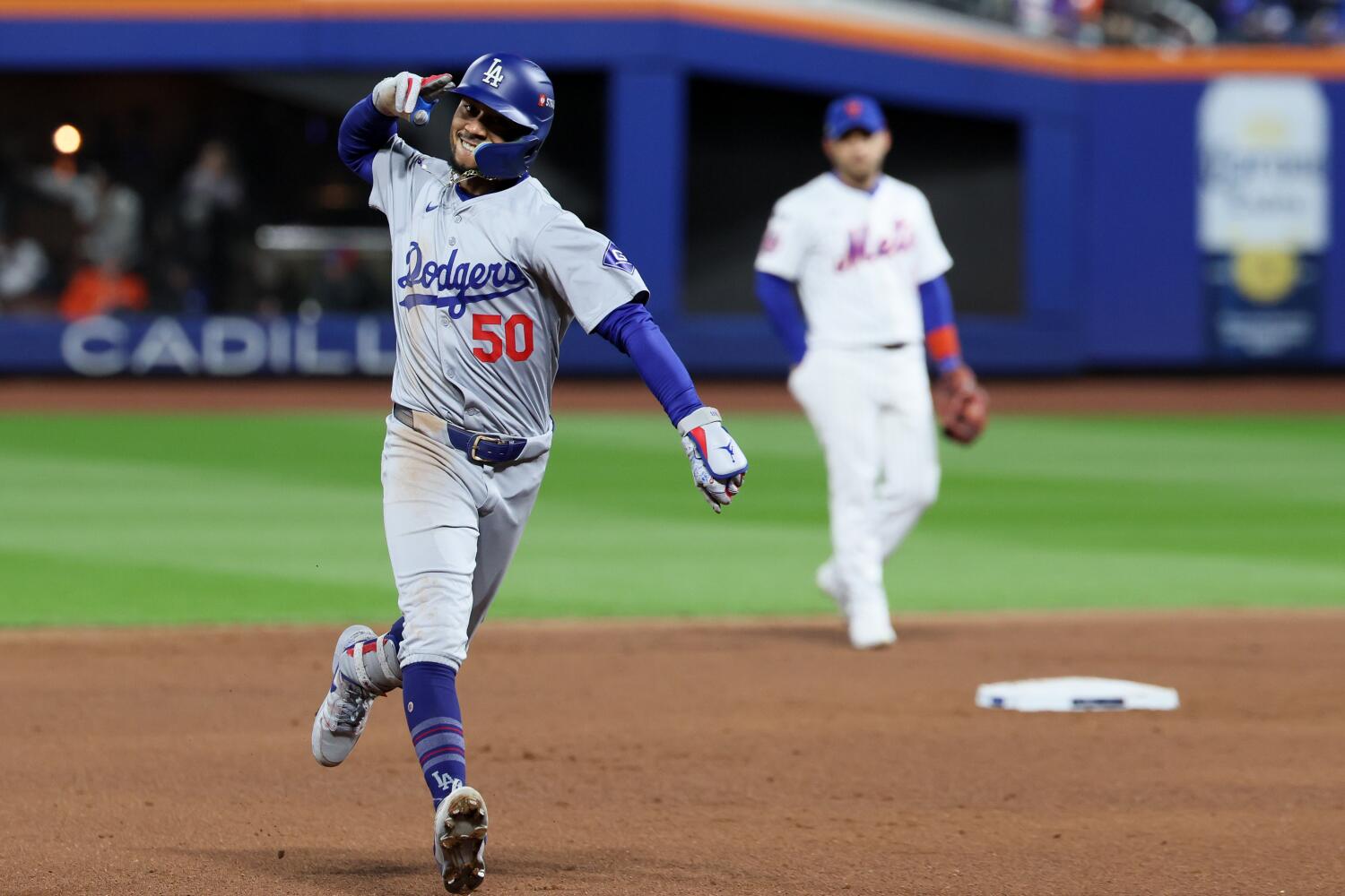 dodgers-show-their-might,-blowing-out-mets-to-move-a-win-away-from-world-series