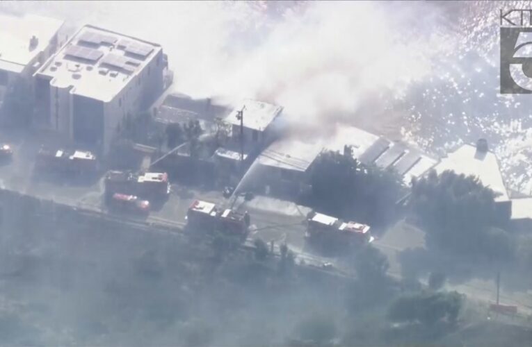 Wildfire erupts in Malibu burning at least 1 home amid gusty Santa Ana winds