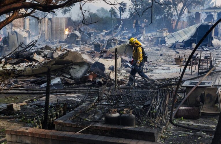 Photos: Mountain fire fueled by Santa Ana winds destroys dozens of homes in Ventura County