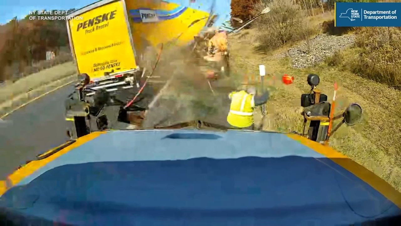 terrifying-video-shows-road-worker-survive-close-call-on-new-york-highway