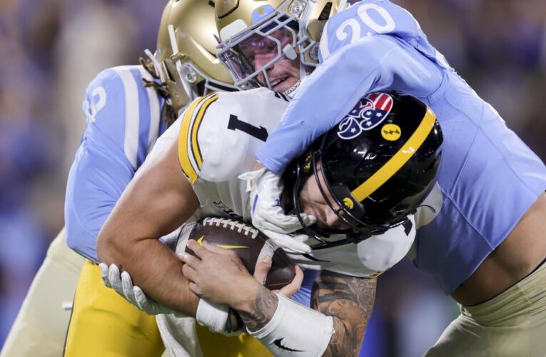 UCLA uses potent defense and explosive run game to beat Iowa, extend its win streak