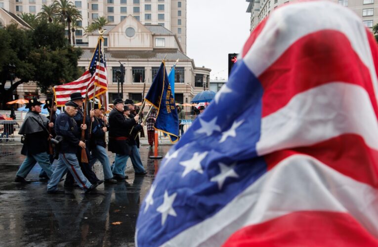 Photos: Despite rain, 106th annual Veterans Day parade marches through downtown San Jose