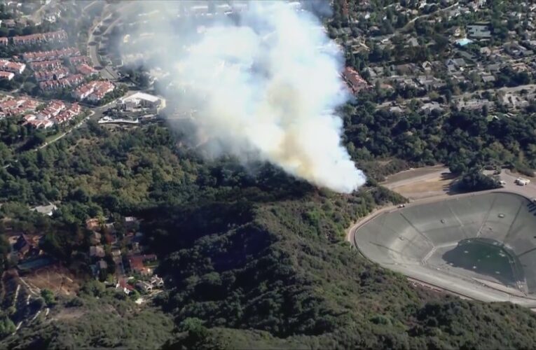 Vegetation fire consumes hillside in Pacific Palisades