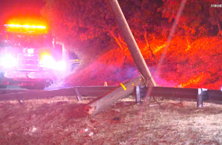 Car plummets off Mulholland Drive after motorist hits power pole