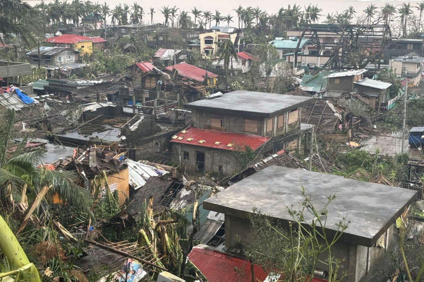 typhoon-hammers-philippines,-displacing-400,000-people