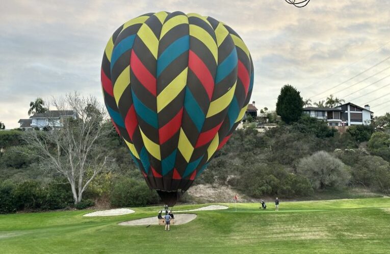 Hot air balloon makes unexpected landing on golf course