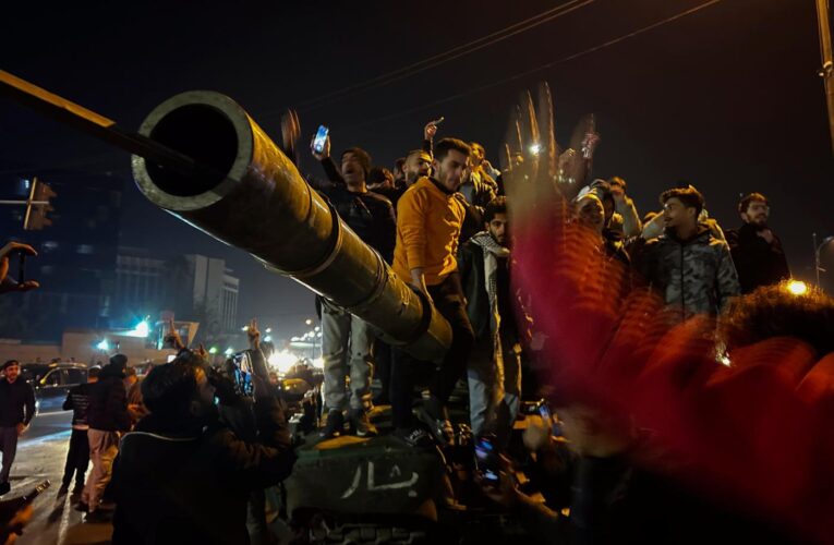 Jubilation and gunfire as Syrians celebrate the end of the Assad family’s half-century rule