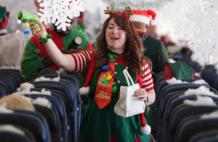 Flight takes kids to visit Santa at North Pole scene in transformed Denver airport hangar