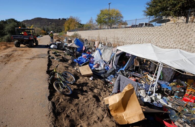 Escondido will spend millions of dollars to seal off a creek after a sudden encampment sweep