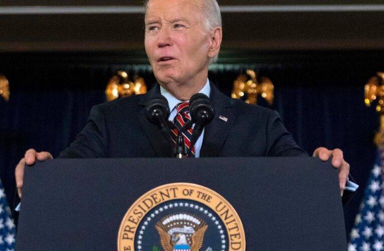 Biden signs defense bill, despite ban on transgender health care for military kids