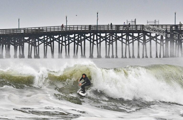 Big waves slam Southern California beaches, more massive surf on the way