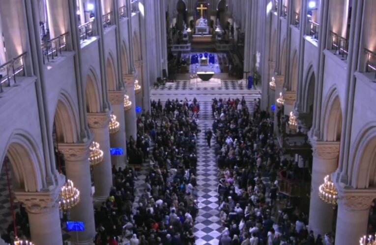 Tourists flock to reopened Notre Dame Cathedral for 1st Christmas Eve Mass since 2019 fire