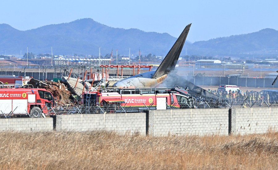 plane-burst-into-flames-after-skidding-off-runway-at-an-airport-in-south-korea,-killing-at-least-62