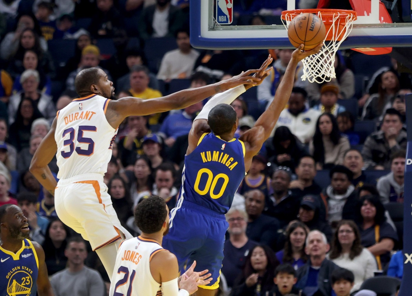 jonathan-kuminga-leads-warriors-past-suns-for-much-needed-win