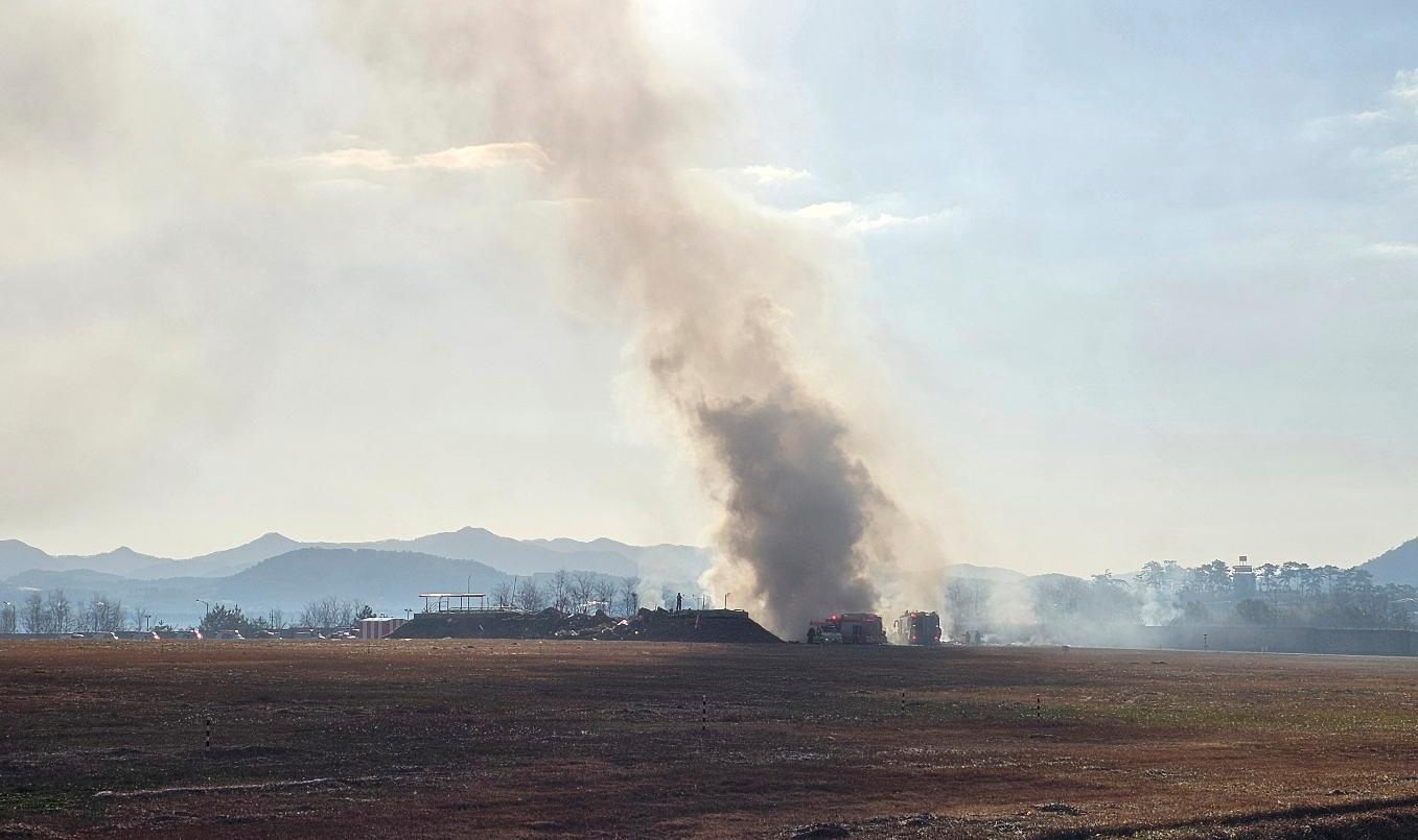 plane-burst-into-flames-after-skidding-off-runway-at-an-airport-in-south-korea,-killing-at-least-124