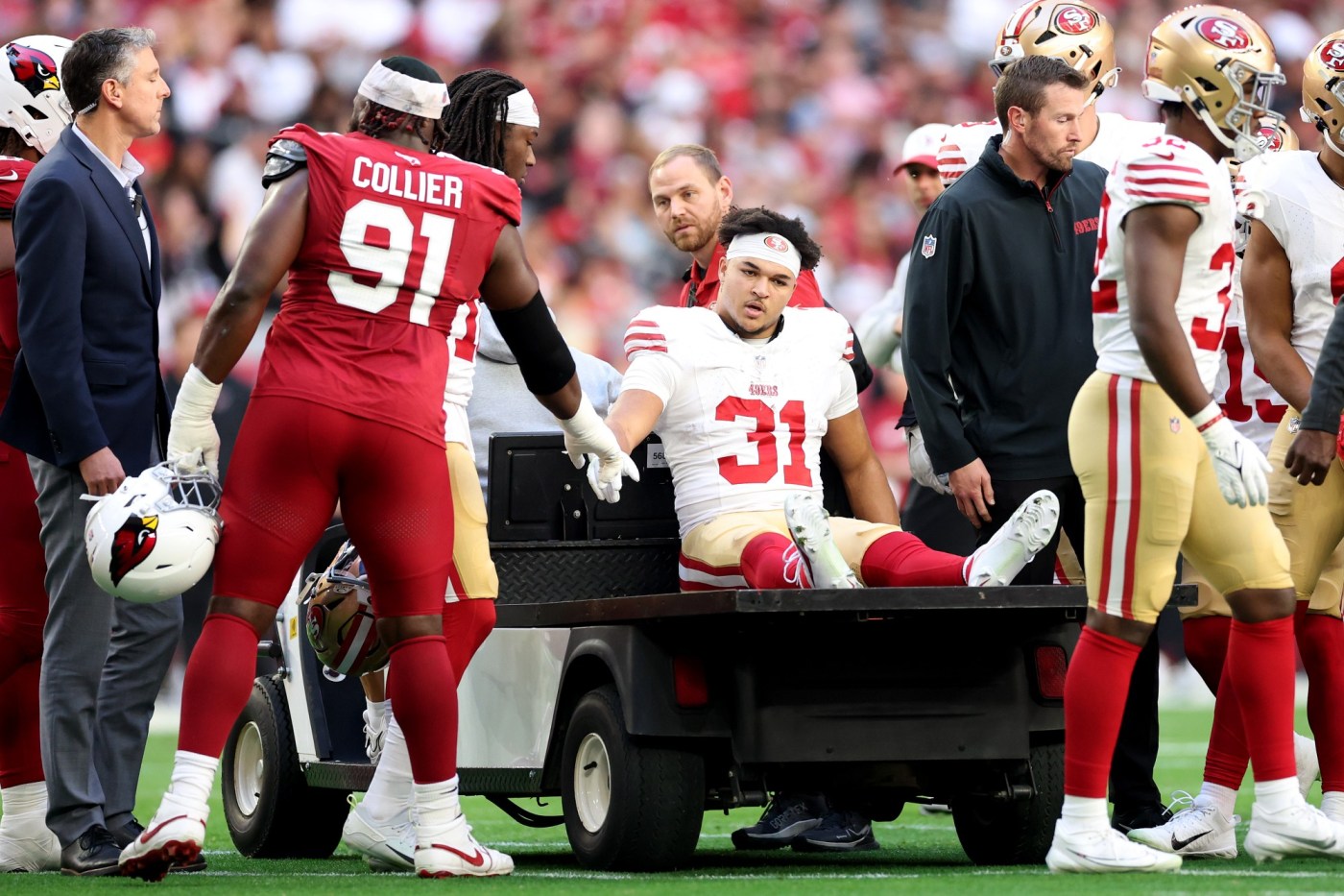 49ers-running-back-isaac-guerendo-carted-off-with-leg-injury