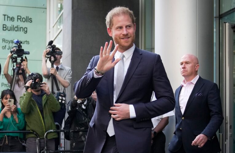 Prince Harry poses with Salinas firefighters amid news of $12 million court victory